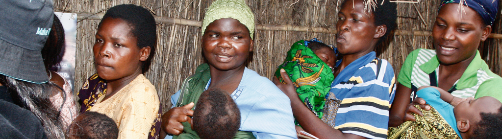 Women queueing in Malawi