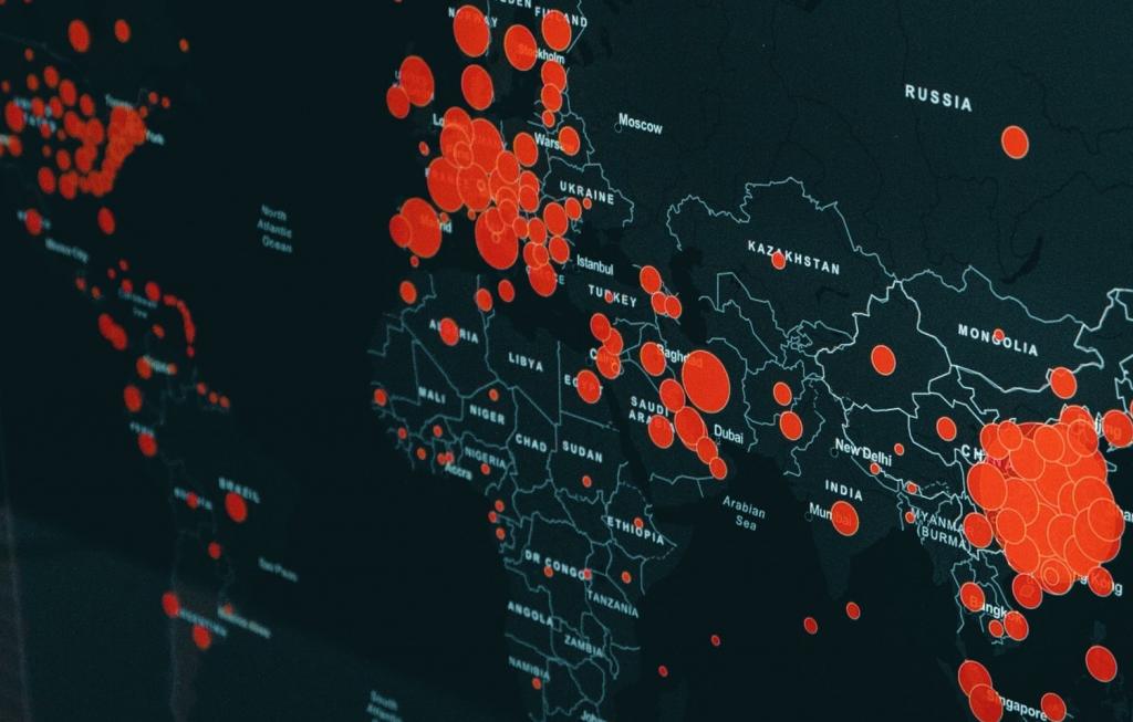 world map with red dots signalizing cases of COVID-19