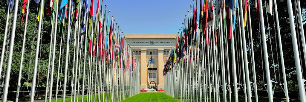 Flags and UN headquarters in Geneva