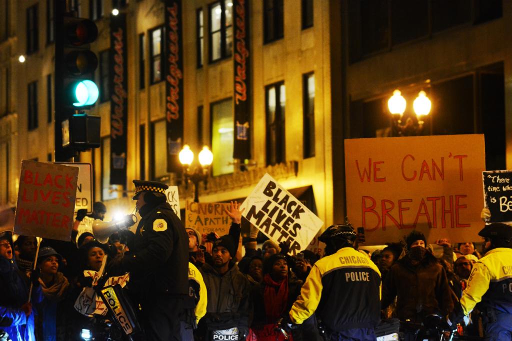 People protest police brutality against African Americans.