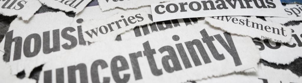 Coronavirus- and economy-related newspaper headlines.