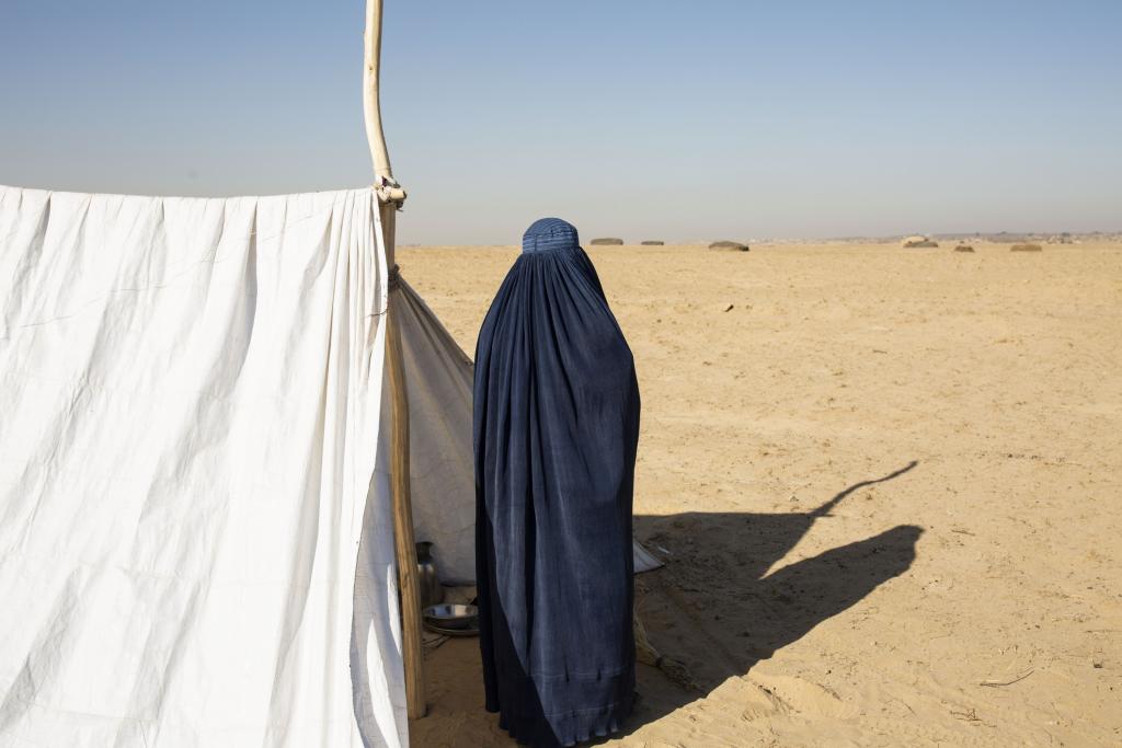 A woman refugee stay in camp where people escape from conflict