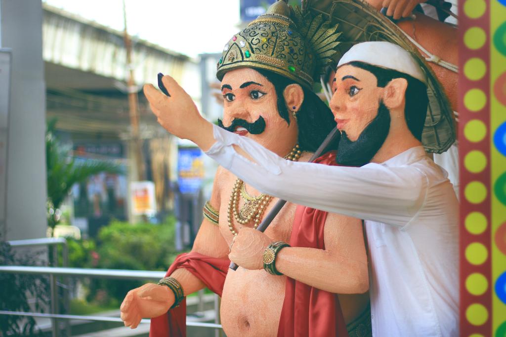 The famous statues showing the cultural diversity of India with a Muslim man taking selfie with Hindu king Mahabali