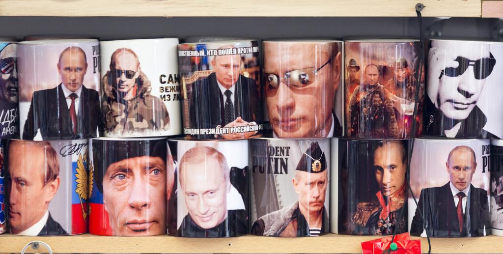 aint Petersburg, Russia- November 20, 2015: Cups with the image of Vladimir Putin are put for sale for the tourists in Saint Petersburg, Russia.