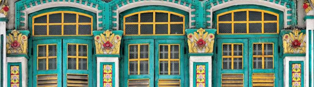 Front view of colourful traditional vintage Singapore Straits Chinese or Peranakan shop house.