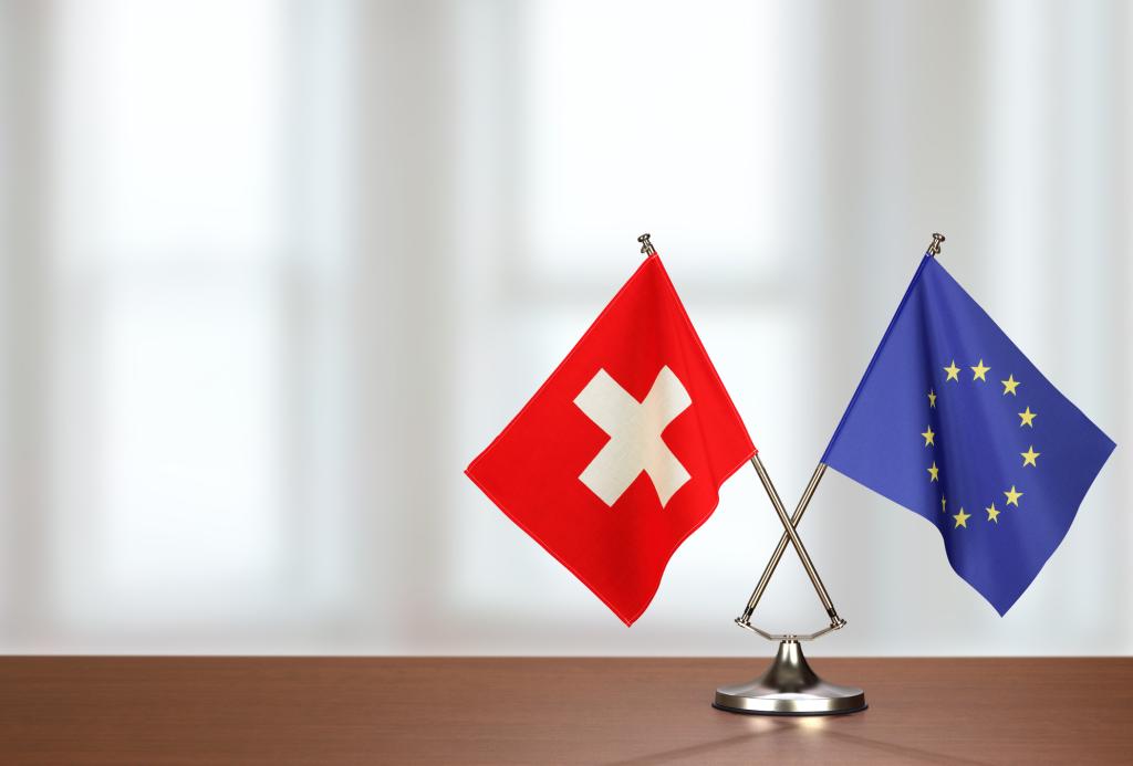 eu and swiss flags