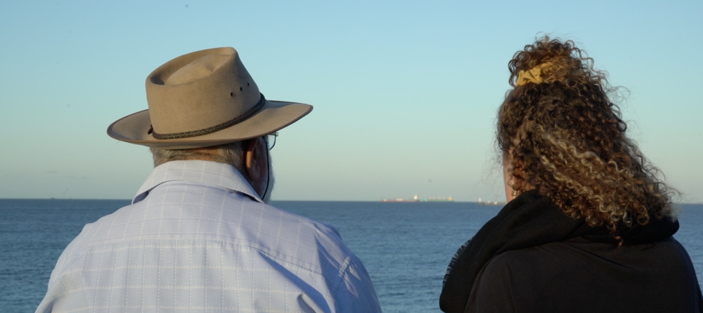 two people looking at the horizon