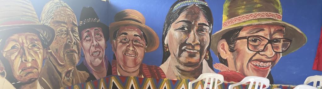Photo showing a painting on the wall of a meeting space in a community centre owned and ran by Indigenous women in Cauca, Colombia.