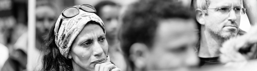 Black and white photo showing protesters for migrant rights in Lausanne, 9 May 2015. © 2015 Gustave Deghilage