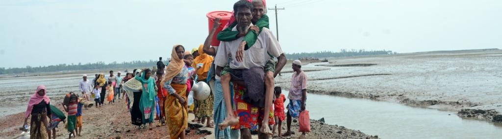 Thousands of Rohingya fleeing Myanmar cross the Bangladesh border at Teknaf and enter Rohingya camps on 7 September 2017, in Cox’s Bazar, Bangladesh.