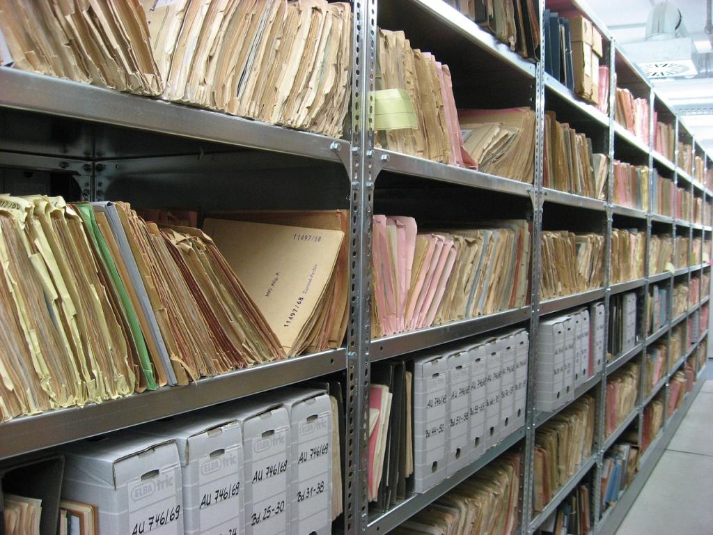 Shelf of paper archives in files