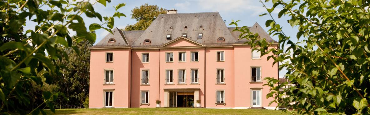 The pink exterior of Villa Barton