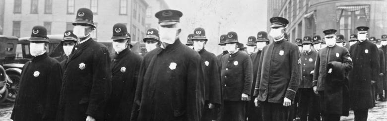 seattle policemen wear masks to protect from the Spanish Flu of 1918