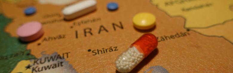 Pills on a map of Iran