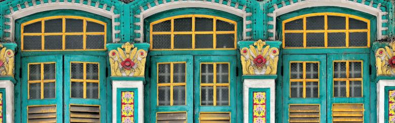 Front view of colourful traditional vintage Singapore Straits Chinese or Peranakan shop house.