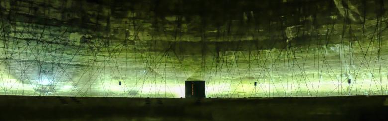 interior of a concrete monument is a green background