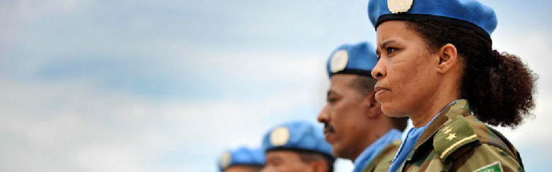 A female member of the Ethiopian battalion of the United Nations Mission in Liberia (UNMIL) joins the military observers in a parade to receive the medals in recognition of their contribution to the mission. 