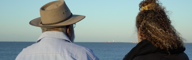 two people looking at the horizon