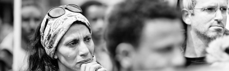 Black and white photo showing protesters for migrant rights in Lausanne, 9 May 2015. © 2015 Gustave Deghilage