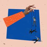 Hand holding people on a string